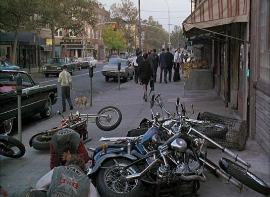 dedicated repairs technician, concentrated gaze, skillfully operating, photorealistic, cluttered workshop with oil-smudged surfaces, highly detailed, steam rising from equipment, technical intricacy, earthy tones, diffused lighting, shot with an 85mm lens.