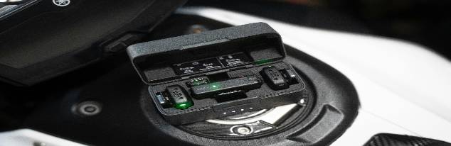 robust audio speaker, powerful, projecting sound, photorealistic, open-air festival with vibrant crowd, highly detailed, vibration visible, macro focus, monochrome, natural midday light, shot with a 24mm lens.