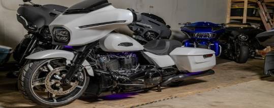 innovative upgrade enhancements, thoughtful expression, calibrating technology, photorealistic, sleek laboratory with futuristic tools, highly detailed, holographic displays, 8k resolution, silver and teal, studio lighting, shot with an 85mm lens