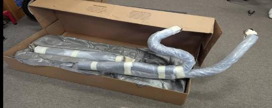 precision performance gear, focused determination, assembling components, photorealistic, cluttered workbench surrounded by mechanical parts, highly detailed, moving machinery, full-frame, deep red, soft spotlight, shot with a macro lens