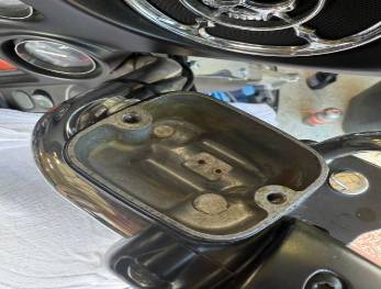 modern maintenance equipment, state-of-the-art, operational mode, photorealistic, warehouse with industrial shelving, highly detailed, motion blur on conveyor, 24mm wide-angle lens, metallic, ambient factory lighting, shot with a Fuji X-T4.