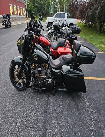 trail cycle night, focused determination, navigating through rugged trail, photorealistic, illuminated path by LED bike lights, highly detailed, dust particles in the air, shutter speed 1/60s, earthy tones, headlamp illumination, shot with an 85mm lens.