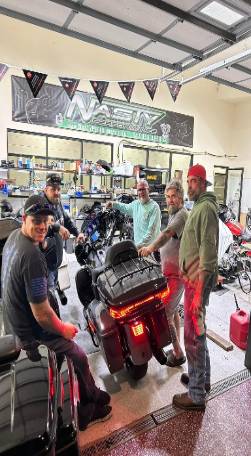 coastal night ride, serene contemplation, pedaling along cliffside, photorealistic, ocean waves crashing against rocks under stars, highly detailed, salt mist in the air, auto white balance, teal and silver, full moonlight, shot with a 100mm lens.